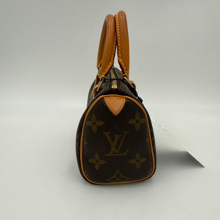Louis Vuitton Nano Speedy Monogram Handbag
