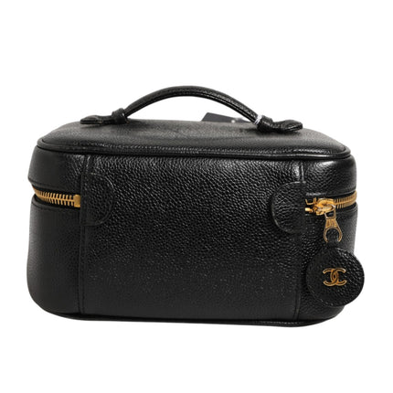 Chanel Black and gold makeup bag