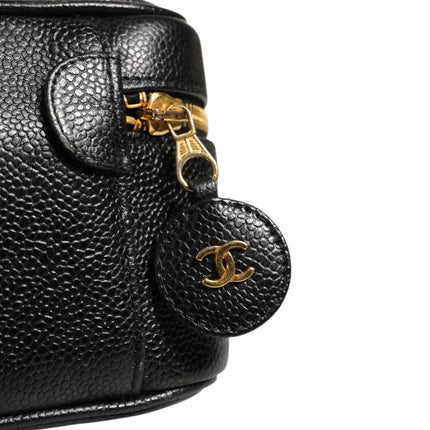 Chanel Black and gold makeup bag