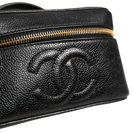 Chanel Black and gold makeup bag
