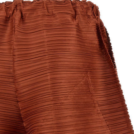 PLEATS PLEASE ISSEY MIYAKE Brown Polyester Casual Pants
