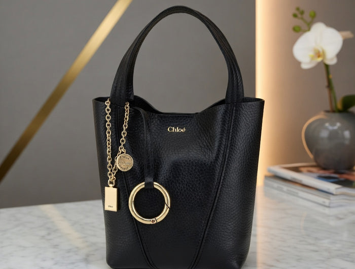 <h3><a href="https://fashion-brands.store/products/chloe-black-calf-leather-bos-taurus-shoulder-bag" title="https://fashion-brands.store/products/chloe-black-calf-leather-bos-taurus-shoulder-bag">Chloé Black Calf Leather Bos Taurus Shoulder Bag</a></h3>