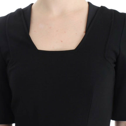 CO|TE Black short sleeve venus dress